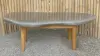  Product image 1 of the product “table made of riverstone with wooden feet. size approx. 118x81,5x38 cm ”